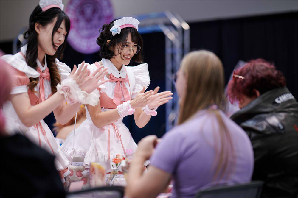 Dreamland Maid Cafe Maids interacting with their guests